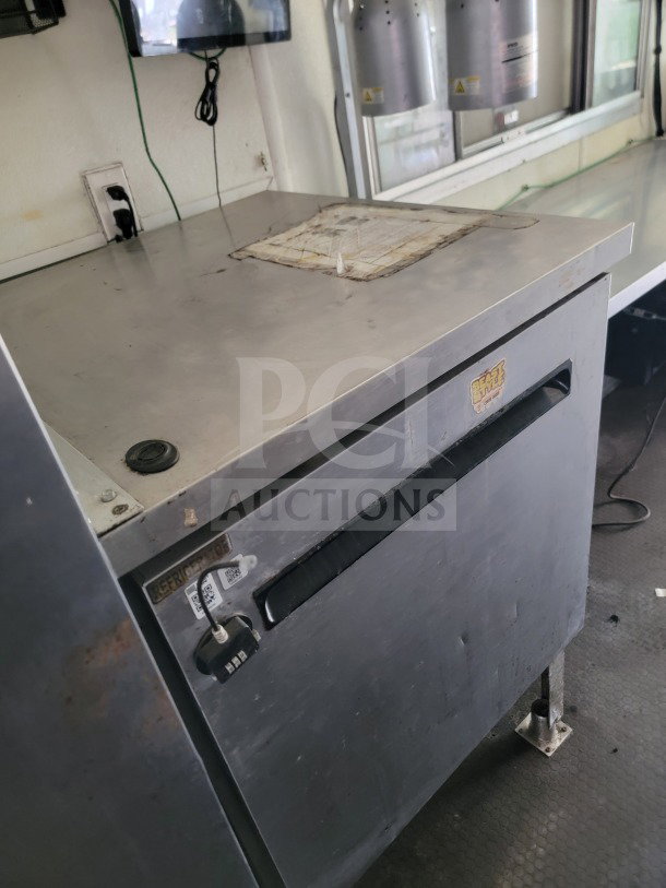 2019 Diamond Cargo mobile kitchen trailer interior, showing an American Range fry line and Globe electric griddle. Good condition.