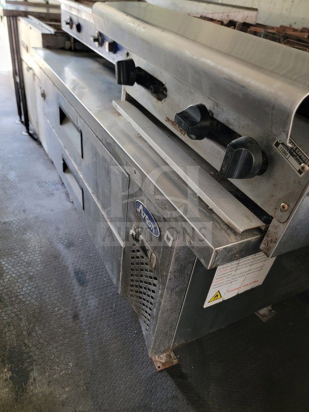 2019 Diamond Cargo 8.5' x 24' mobile kitchen trailer, featuring American Range fry line, Globe Electric griddle. Fair condition.