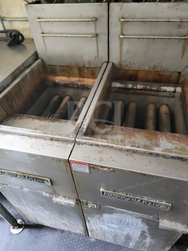 American Range Fry Line in used condition, part of 2019 Diamond Cargo Mobile Kitchen Trailer. Visible wear and rust.