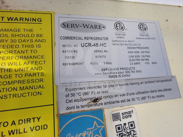 Serv-Ware commercial refrigerator label with model UCR-48-HC details, including certifications, refrigerant type, and pressure ratings.