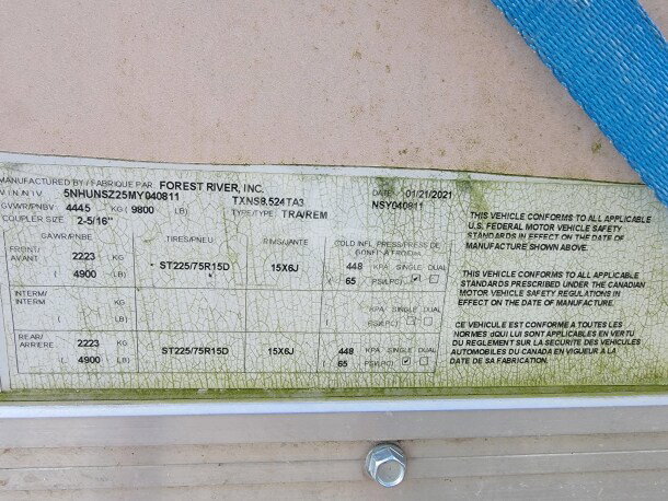 2021 Forest River 24' mobile kitchen trailer VIN 5NHUNSZ25MY040811, compliance labels showing safety standards.