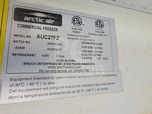 Label on Arctic Air Commercial Freezer, Model AUC27FZ. Shows refrigerant type, batch, and serial number. Made by Broich Enterprises.