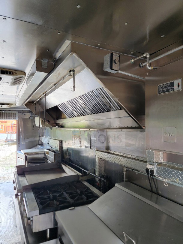 2021 Forest River 8.5' x 24' mobile kitchen trailer, features Royal Range cooking suite, Arctic Air refrigeration, excellent condition.