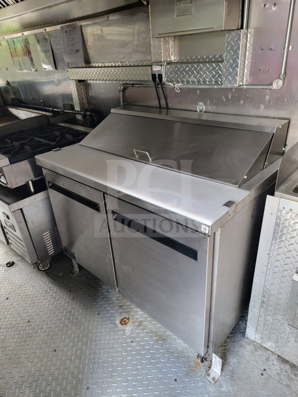 2021 Forest River 8.5' x 24' mobile kitchen trailer interior, featuring Royal Range and Arctic Air refrigeration.