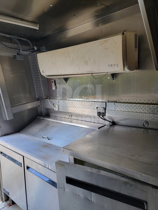 2021 Forest River 8.5' x 24' mobile kitchen trailer interior with Royal Range cooking suite and Arctic Air refrigeration.
