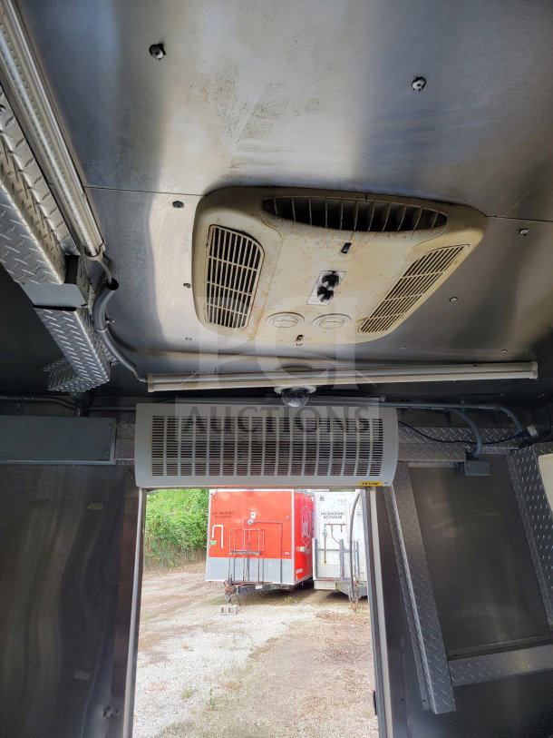 2021 Forest River 8.5' x 24' mobile kitchen trailer interior, showing ceiling vents and metal detailing.