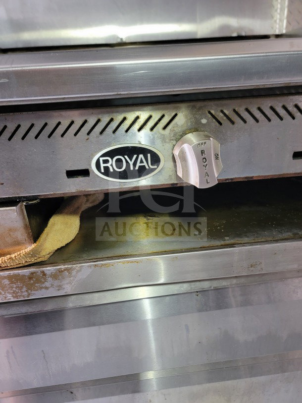 Royal Range cooking suite knob on a Forest River mobile kitchen trailer, showing "Off" and "On" settings.
