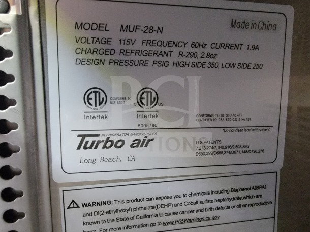Turbo Air label on refrigeration unit showing model MUF-28-N, voltage 115V, and refrigerant R-290. Made in China.
