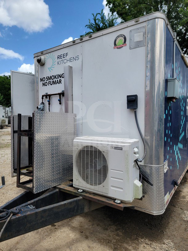 2019 Diamond Cargo 8.5' x 24' mobile kitchen trailer, commercial food service setup, visible "REEF KITCHENS" logos, tandem-axle.