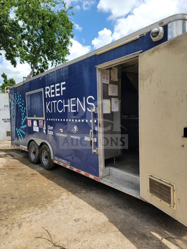 2019 Diamond Cargo 8.5' x 24' mobile kitchen trailer, commercial setup, visible "Reef Kitchens" branding, side door open.