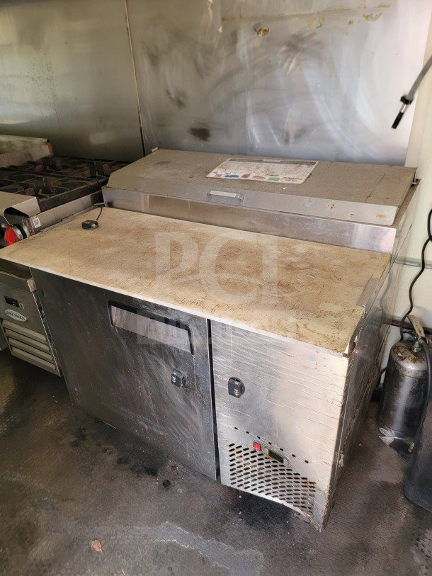 2019 Diamond Cargo 8.5' x 24' mobile kitchen trailer interior, showing commercial-grade cooking and refrigeration equipment.