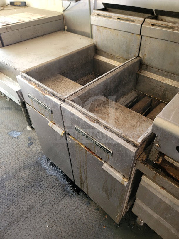 American Range cooking suite with visible wear, inside 2019 Diamond Cargo 8.5' x 24' mobile kitchen trailer, LOT #14.