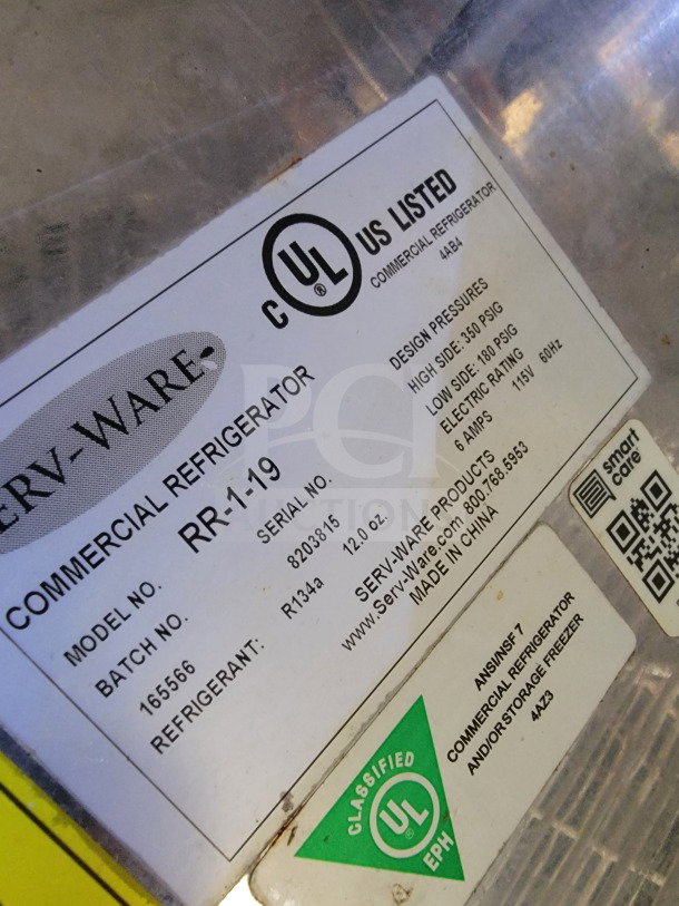 Label on Serv-Ware Commercial Refrigerator RR-1-19. Showing UL listing, model info, design pressures, refrigerant type.
