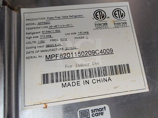 Pizza Prep Table Refrigerator label showing model MPF8201, temperature range 33–45°F, R134a refrigerant, volts 115V, made in China.