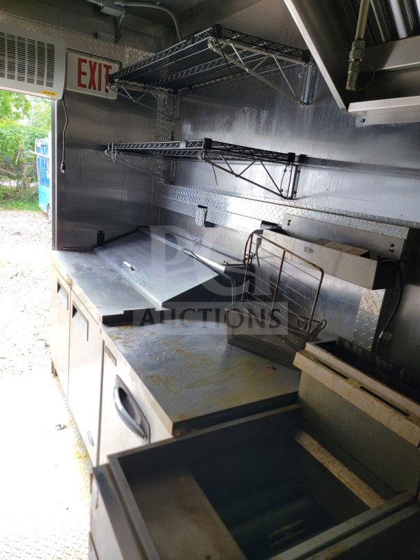 2021 BT&S 24 Mobile Kitchen Trailer interior with stainless steel counters, HVAC Mirage VentusX, storage shelves, and cooking equipment.