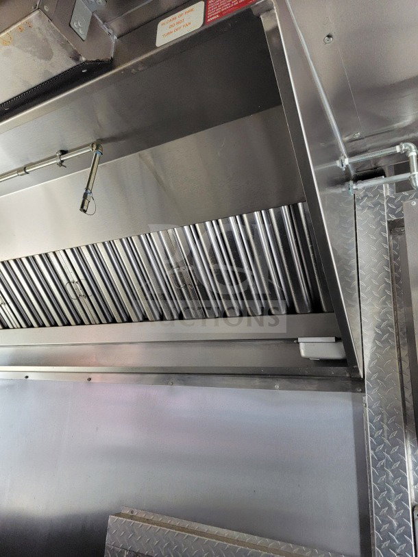 2021 BT&S mobile kitchen trailer with HVAC Mirage VentusX. Stainless steel interior, visible venting system, pristine condition.