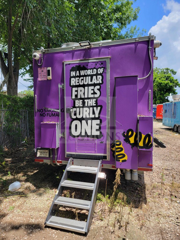 2021 Titanium Cargo 8.5' x 24' tandem-axle mobile kitchen trailer, purple with text, steps to rear door, VIN 7PLBC2421MM000429.
