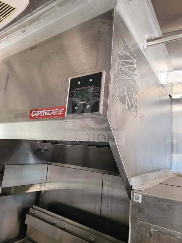 CaptiveAire hood in Titanium 24 mobile kitchen trailer; features control panel; part of 2021 tandem-axle unit.