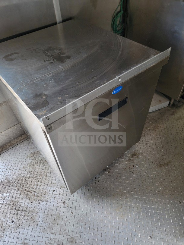 2021 Titanium Cargo 8.5' x 24' mobile kitchen trailer interior; stainless steel countertop, eControl label visible.