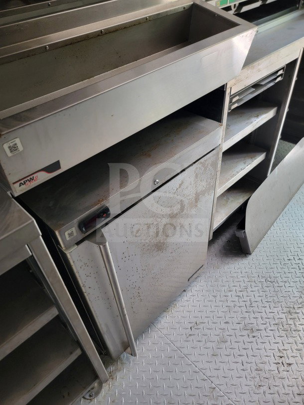 2021 Titanium Cargo 8.5' x 24' Mobile Kitchen Trailer, stainless steel interior, visible equipment, used condition.