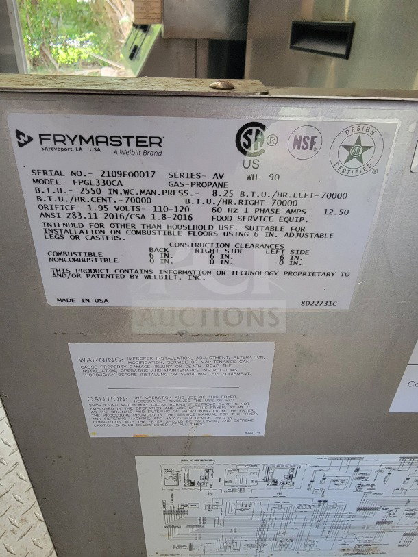 Label on Frymaster fryer showing model FPGL330CA, serial number 2109E00017, specifications for gas-propane, 8.25 B.T.U., and design certifications.