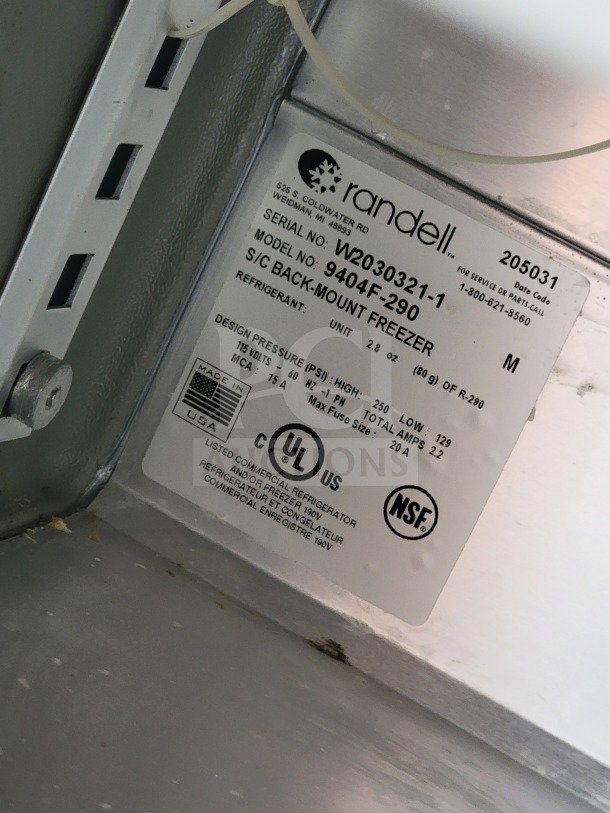 Label on Randell 9404F-290 back-mount freezer. Shows serial number W2030321-1. Certifications include NSF and UL.