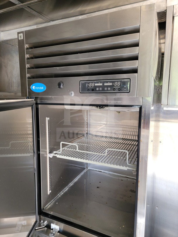 Randell refrigerator inside a 2021 Titanium Cargo mobile kitchen trailer, showing open door and digital controls.