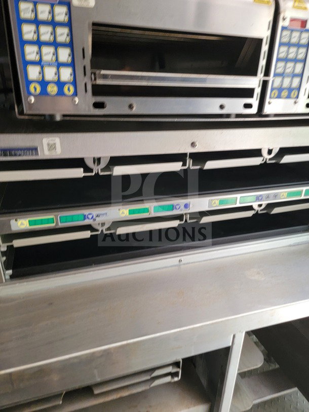 2021 Titanium Cargo 8.5' x 24' mobile kitchen trailer interior. Features Randell & Frymaster suite controls.
