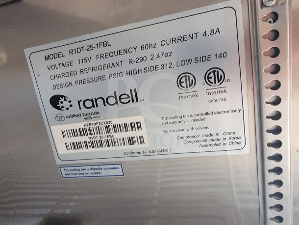 Label on Randell refrigeration unit for mobile kitchen trailer, Model R1DT-25-1FBL, showing specifications and certifications.
