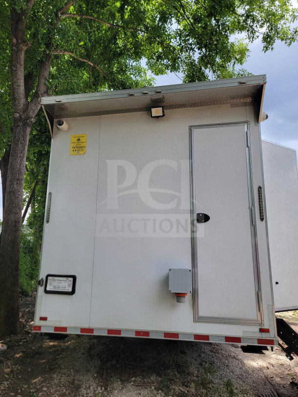 2021 Southern Dimensions 8.5' x 26' mobile kitchen trailer, SDG Model 26. White exterior, tandem-axle, corporate configuration.