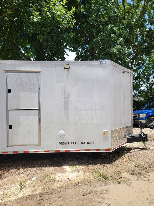 2021 Southern Dimensions 8.5' x 26' mobile kitchen trailer, tandem-axle, labeled "VESSEL TX OPERATIONS," parked outdoors.