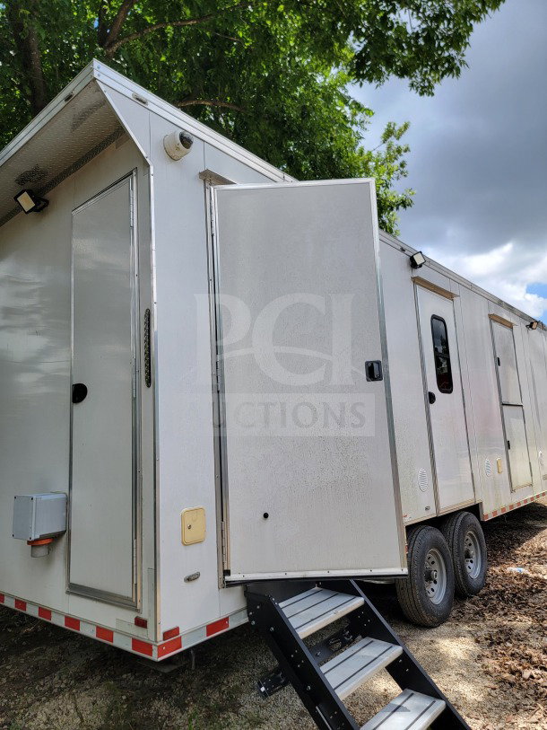 2021 Southern Dimensions 8.5' x 26' mobile kitchen trailer, tandem-axle, CaptiveAire hood, Turbo Air/True refrigeration.
