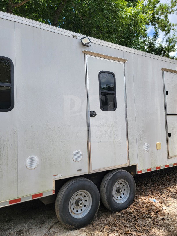 2021 Southern Dimensions 8.5' x 26' tandem-axle mobile kitchen trailer, SDG Model 26, white exterior, side door visible.