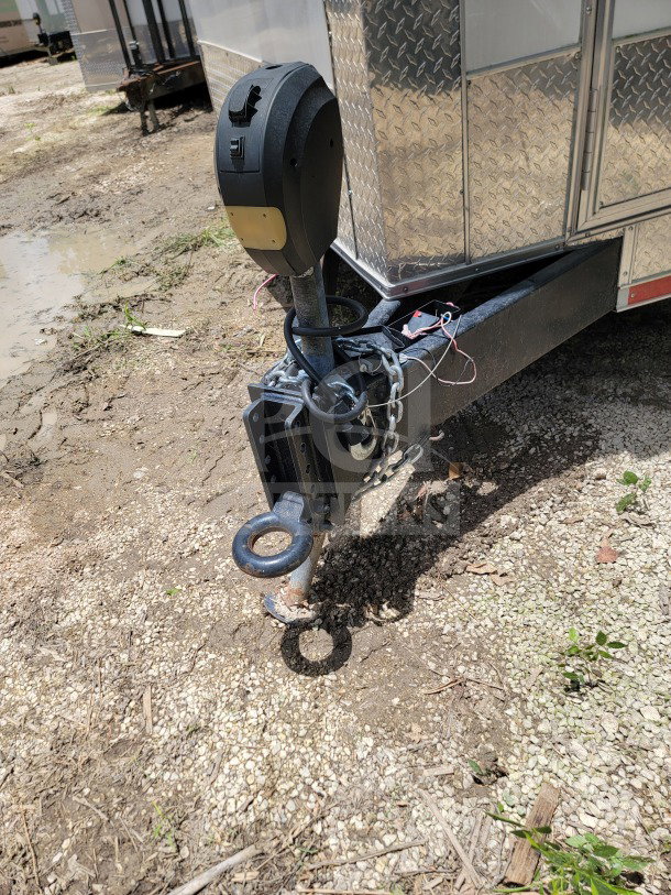 2021 Southern Dimensions 8.5' x 26' tandem-axle mobile kitchen trailer hitch and front view, featuring diamond plate siding.
