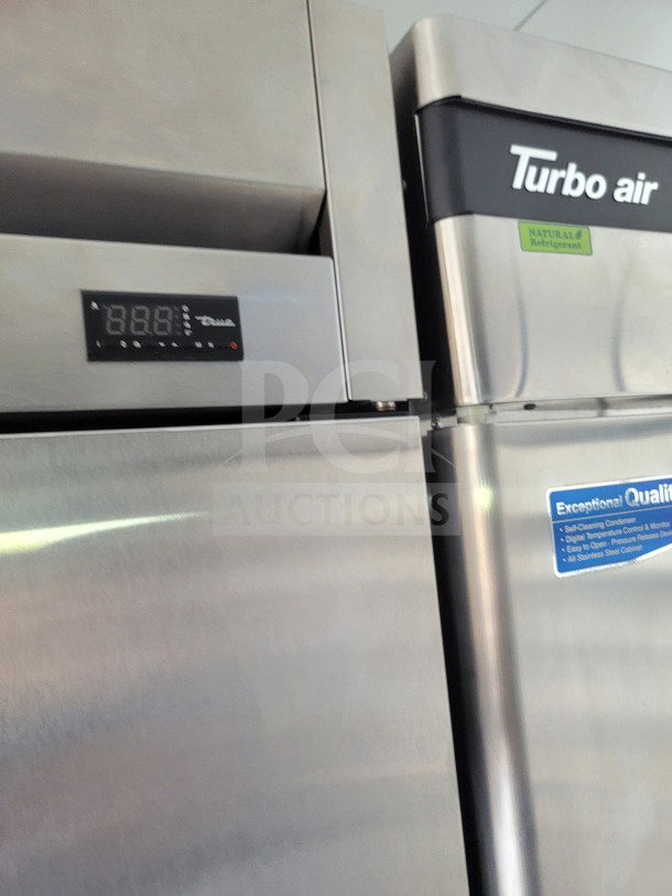 Turbo Air refrigerator in mobile kitchen trailer with digital display and stainless steel finish, showcasing high quality features.