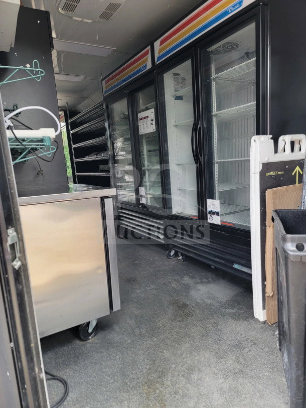 2021 SDG 8.5' x 20' mobile trailer with tandem-axle, merchandisers, freezers, and POS workstation; excellent condition.