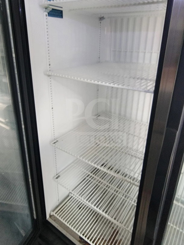 Interior of SDG 20 mobile fulfillment trailer showcasing a multi-shelf freezer with clean white wire racks.