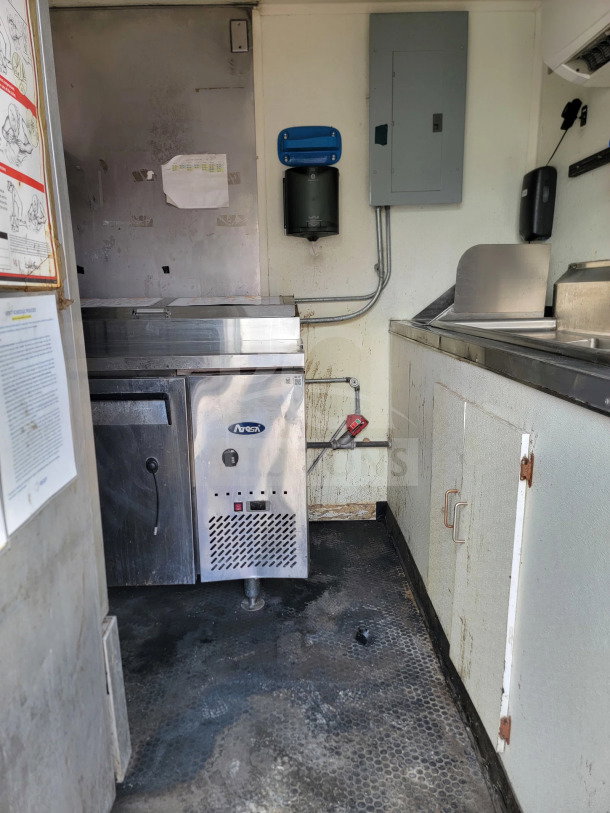 2019 Diamond Cargo 8.5' x 24' mobile kitchen trailer interior, featuring American Range fry line and Globe electric griddle.
