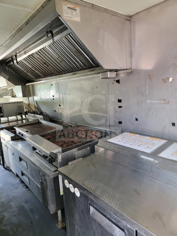 2019 Diamond Cargo 8.5' x 24' Mobile Kitchen Trailer, featuring American Range fry line, Globe Electric griddle, in used condition.