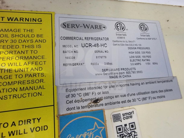 "Serv-Ware UCR-48-HC commercial refrigerator label, including batch no. 165339, serial no. 8176778, and specs. Made in China."