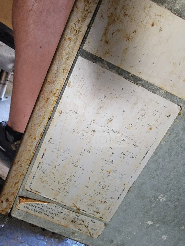 Rusted label inside 2019 Diamond Cargo 24' kitchen trailer, showing maintenance instructions and VIN details.