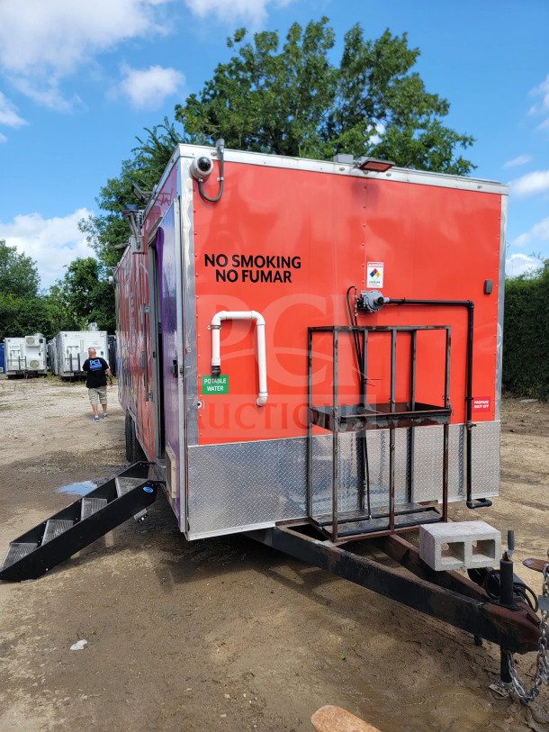Rock Solid Cargo 2021 8.5' x 24' mobile kitchen trailer, dual-axle, red exterior, "No Smoking" signage, visible steps.