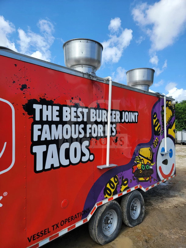 2021 Rock Solid Cargo 8.5' x 24' dual-axle mobile kitchen trailer; red exterior, CaptiveAire hood, vibrant graphics.
