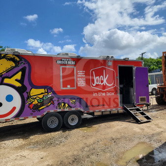 2021 Rock Solid Cargo 8.5' x 24' mobile kitchen trailer with dual-axle, CaptiveAire hood, and vibrant exterior graphics.
