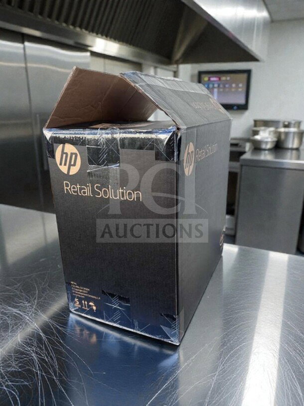Brand new HP Engage One AIO Model 145 POS system in original box, featuring commercial touchscreen. UL Listed.