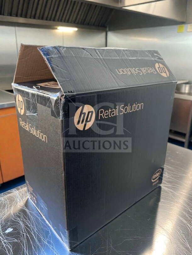 Brand new HP Engage One AIO POS System Model 145 in original box, UL listed, features touchscreen, unopened condition.