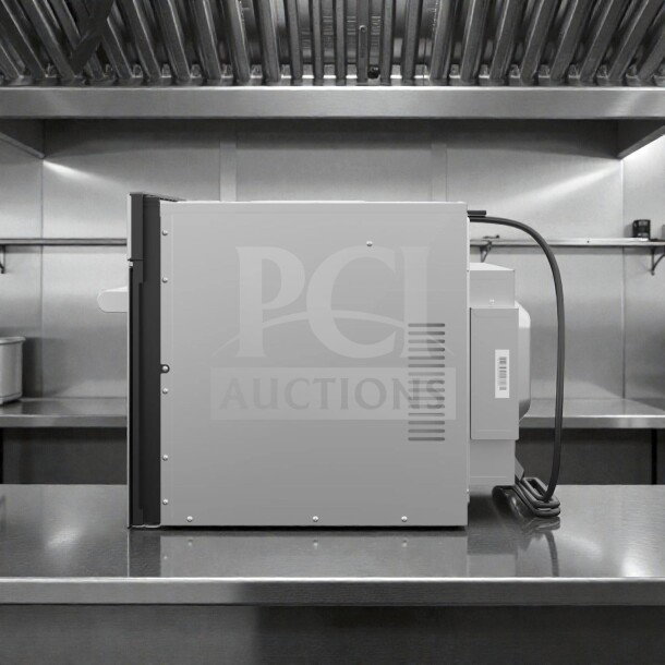 Brand new KoolMore KM-CWO24-SS 24" stainless steel built-in convection oven with microwave, in original box, pristine condition.