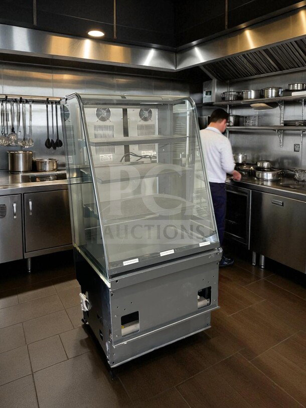 Curved Glass Refrigerated Display Case in excellent condition with 4 adjustable shelves; 115V, UL Listed, fully tested.