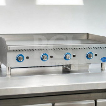 Globe GG48G commercial griddle with four blue control knobs, stainless steel, excellent condition, ideal for professional kitchens.