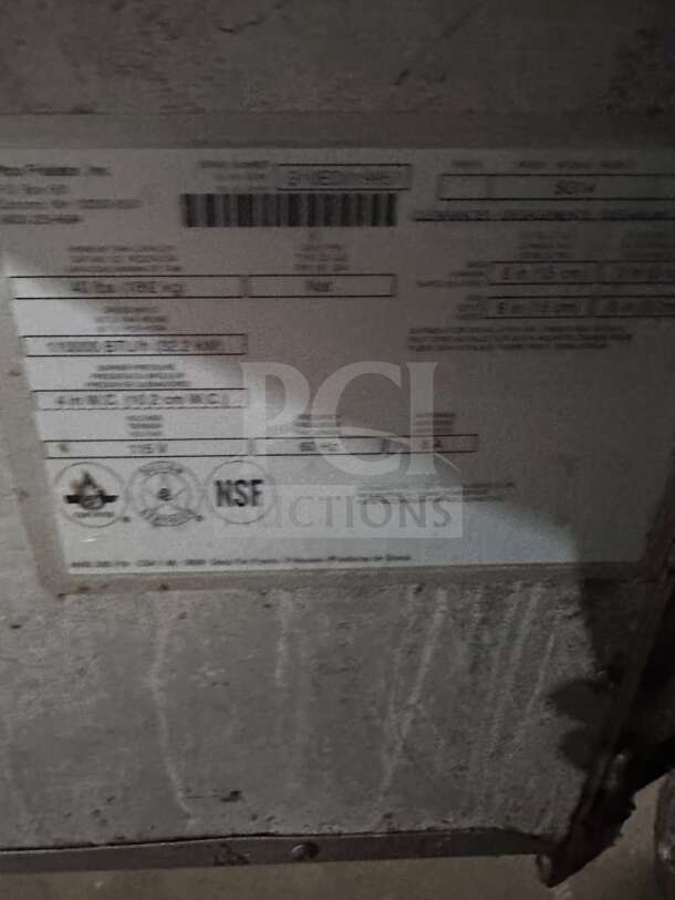 Label on Pitco SG14 commercial gas fryer shows model, NSF and CSA certification symbols, confirming natural gas use.